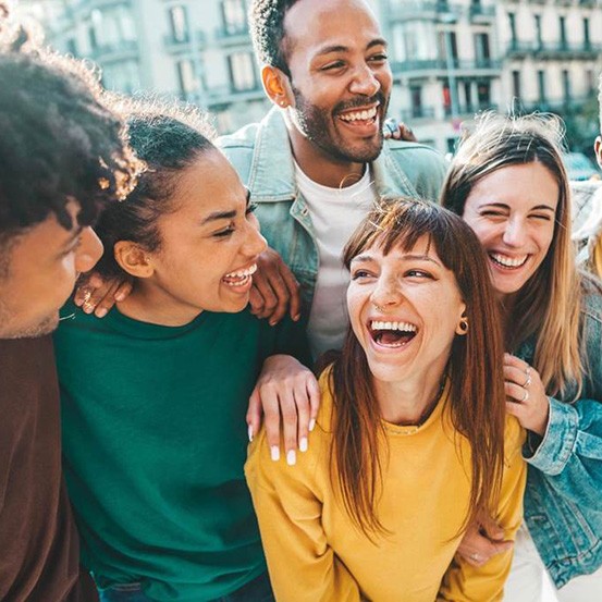 group of friend laughing and hanging out together