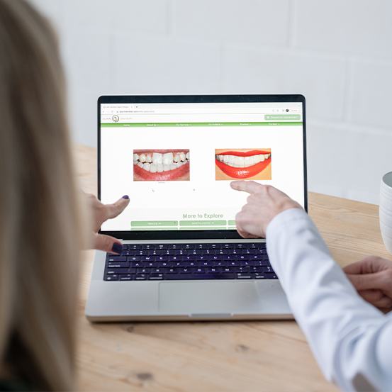 Dentist using virtual smile design software