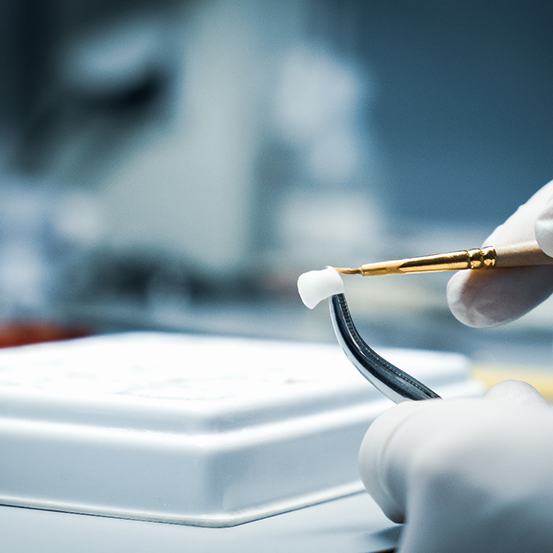 a technician creating a dental crown in Upper Arlington