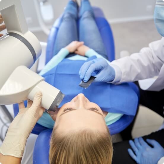 Woman receiving emergency dentistry treatment