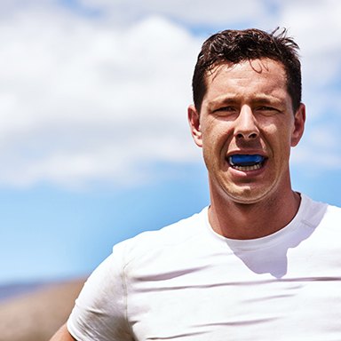 If you play sports or grind your teeth, be sure to wear a protective mouthguard to keep your dental implants safe