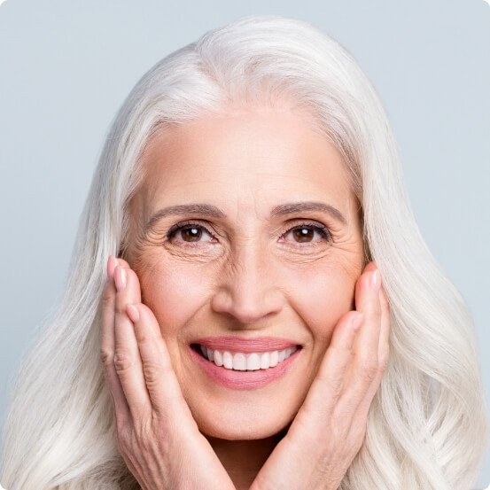 Woman enjoying the benefits of dental implants