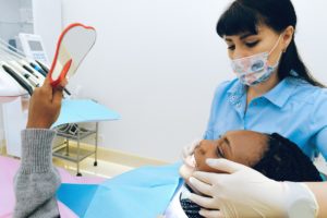 Woman having consultation with cosmetic dentist
